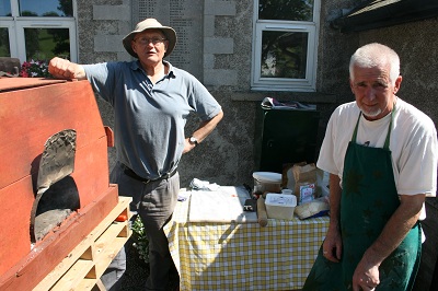 Oliver and Peter making pizza at the Crosby Ravensworth Food Fair