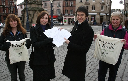 Rory Stewart MP receiving the PACT petition asking for a charge on single user carrier bags